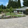 NEW STAMPED CONCRETE WALKWAYS AND DRIVEWAY.  NEW IRRIGATION SYSTEM, DRAINAGE, LIGHTING AND PLANTS.